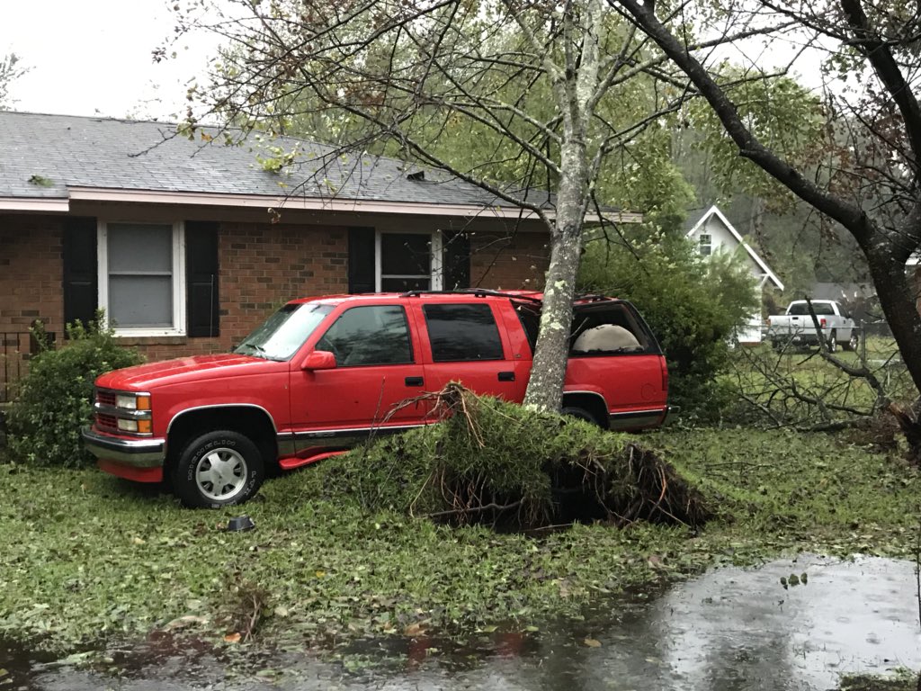 Hurricane Florence knocks trees onto vehicles in Wilmington, NC   