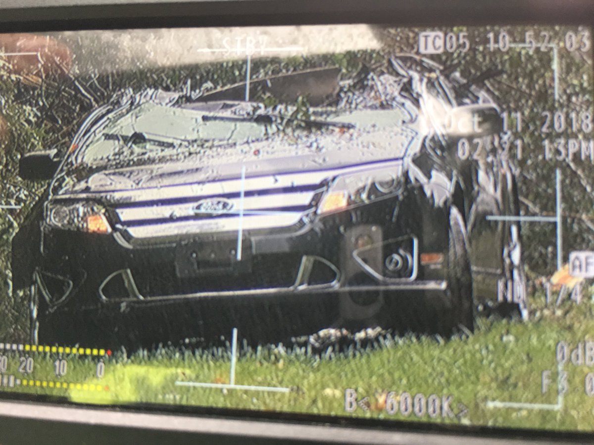 Firefighters tell a driver was killed coming down the roadway when a tree fell on the car crushing it in Iredell County