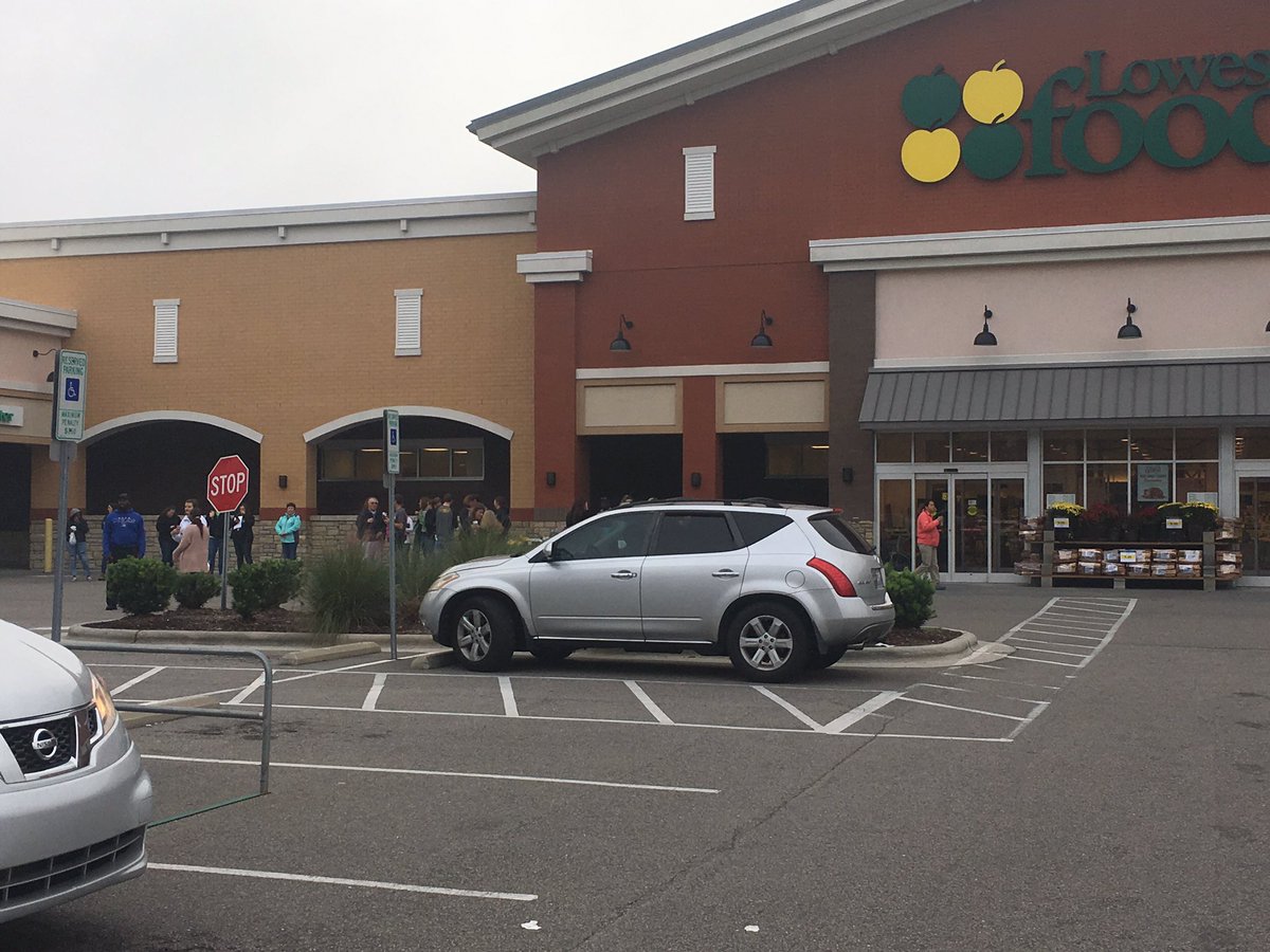 Buses that were still in route to Topsail High School, Middle School, and Elementary School are pulling into the Hampstead Lowe's foods parking lot where parents are able to pick up these students with proper ID.  