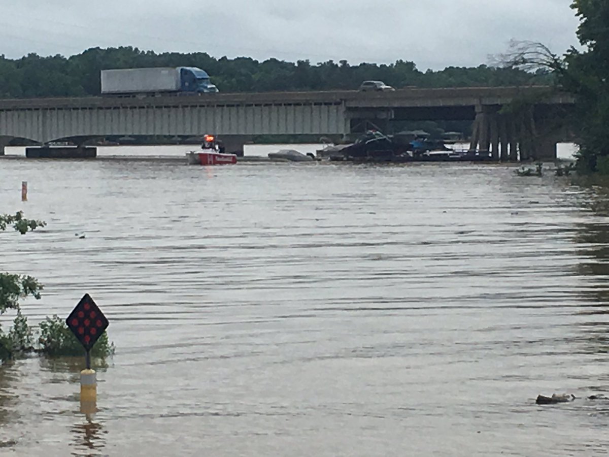 Crews are retrieving boats that floated under the bridge on NC 16. Several boats and boat docks got stuck during this weekend's storms 