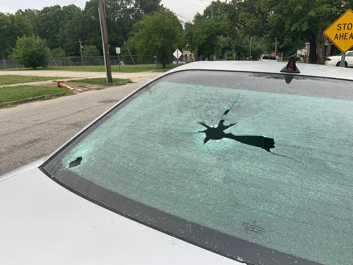 A woman told the Henderson police officer was shot while investigating the drive-by shooting of her younger cousin who turned just 16 on Monday. He died at the hospital, she said