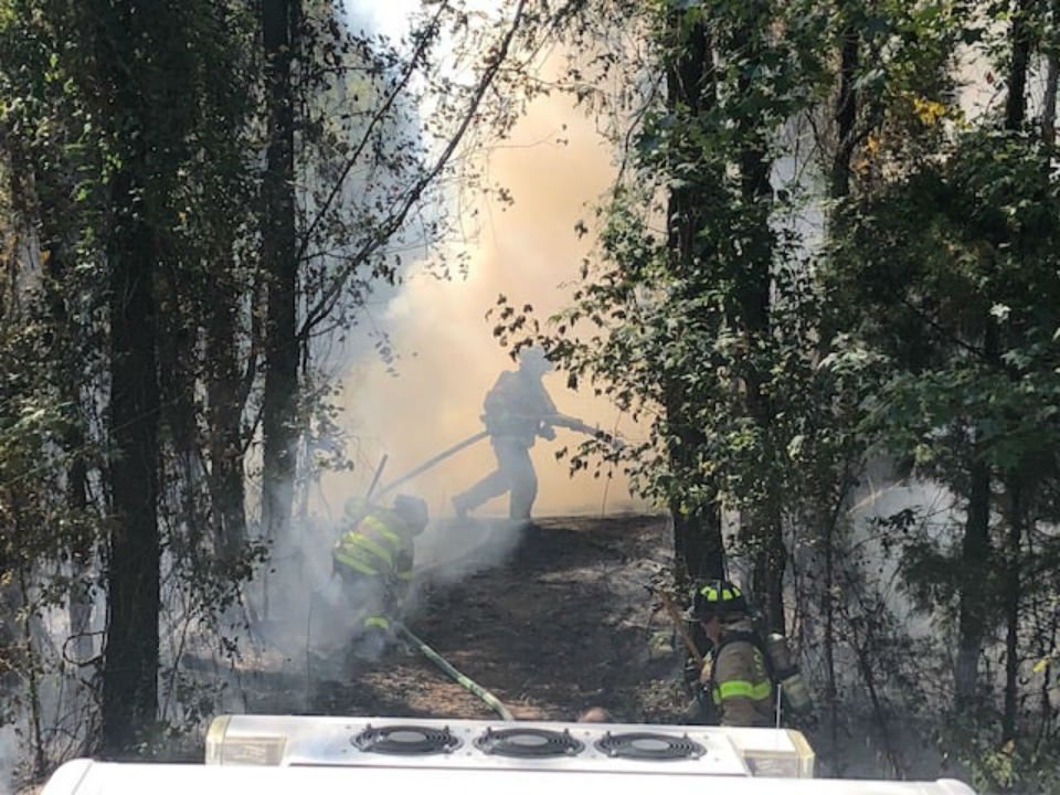 Jacksonville Fire & Emergency Services, Camp Lejeune Fire &amp; Emergency Services, Southwest Volunteer Fire Department, Onslow County EMS and NC Forestry Service are on the scene of a brush fire