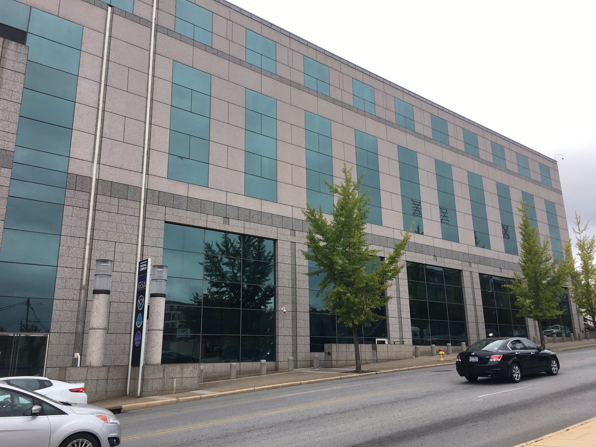 Someone with a handgun shoots up federal building in downtown Asheville after shooting a man outside Scandal's nightclub 2am this morning.
