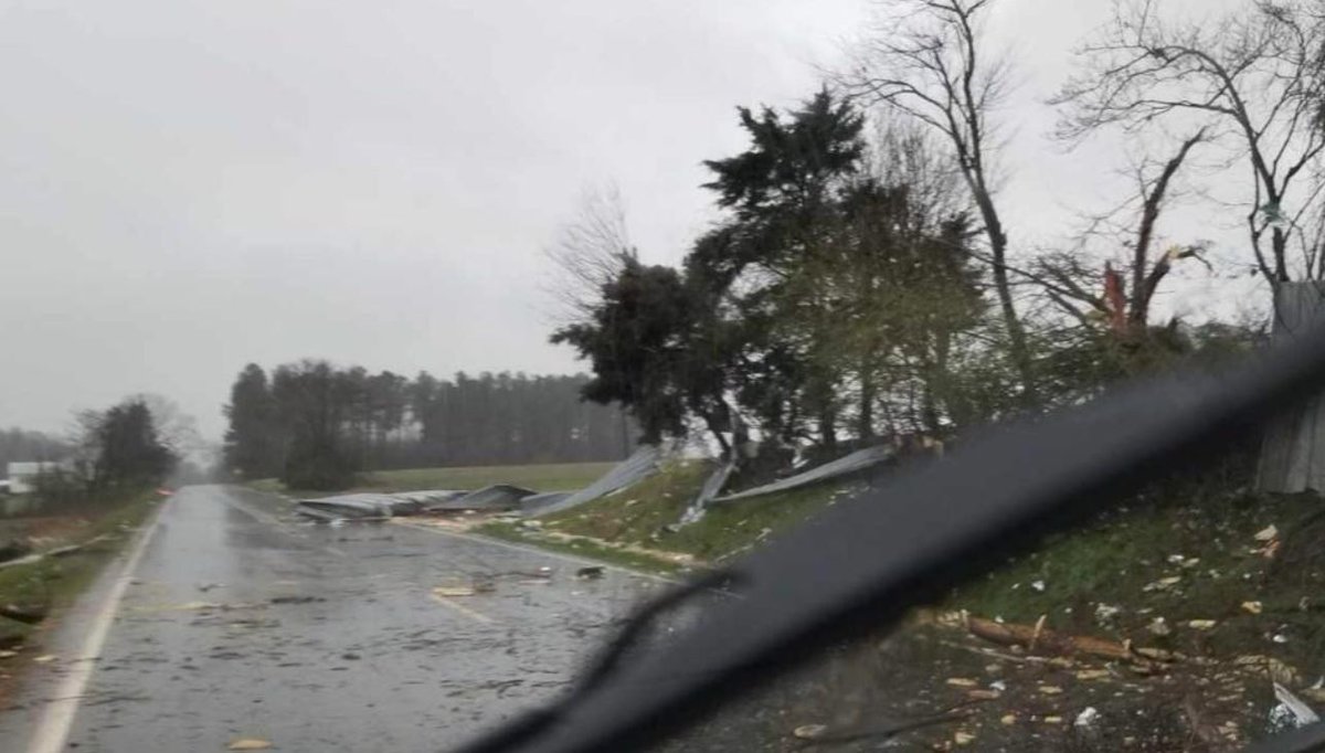 Storm damage on Ramseur Julian Road in Liberty in Randolph County. The National Weather Service is working to confirm if a tornado hit the area. Last night's severe weather uprooted trees, snapped power lines, flooded roads, and damaged property