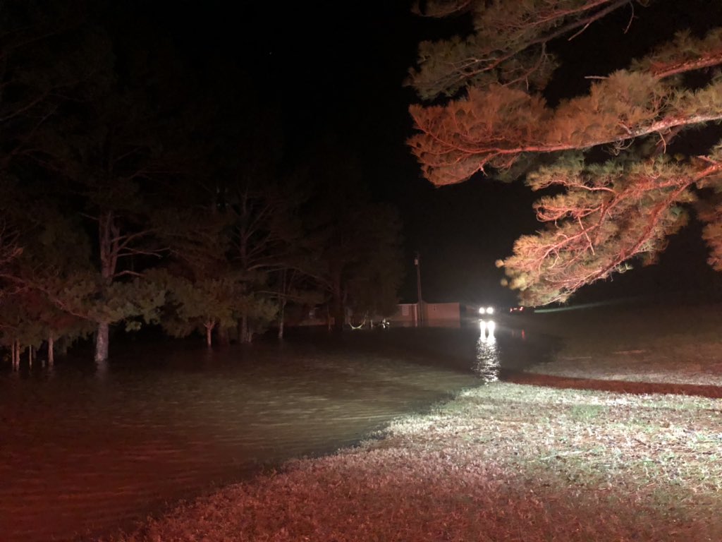 Woodleaf Firefighters in Rowan County rescued 8 people + cage of birds from this home surrounded by water