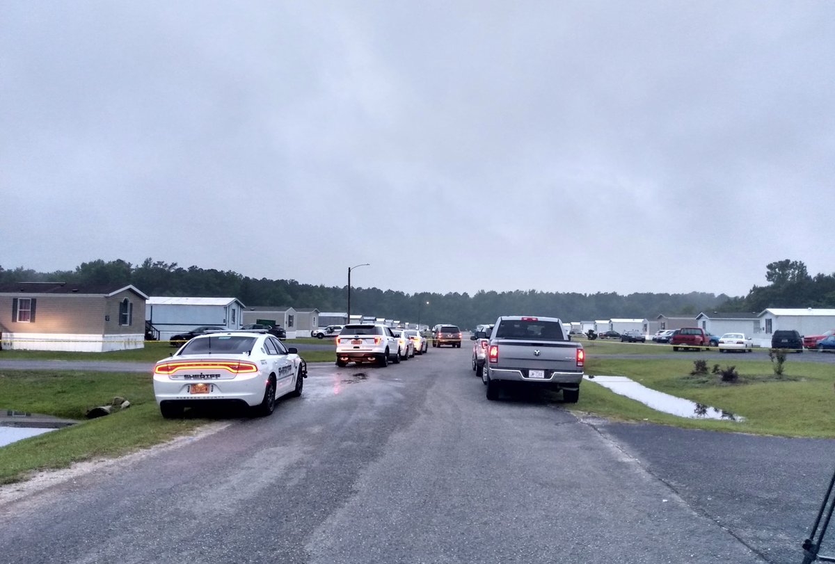 Deputies still on scene of a shooting incident earlier this morning near Alamac village in Robeson County. yellow crime scene tape around several homes.  Still no word on if a child was hurt in the incident