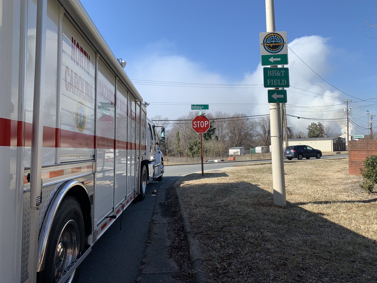 Here are a few pictures from just outside the evacuation zone. We're just over a mile from the Weaver Fertilizer Plant in Winston-Salem.   There's a helicopter overhead and two haz mat trucks, one from the state and one from WSFD, and that massive plume of smoke in view