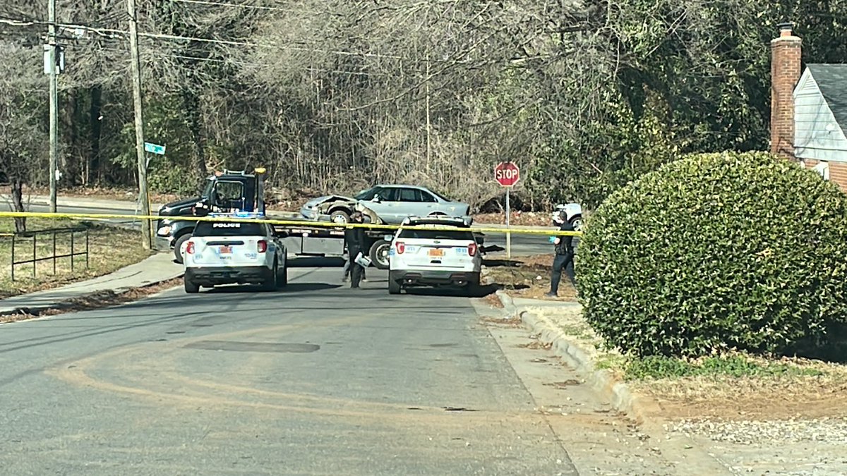 A tow truck is now removing the damaged vehicle from the wooded area. More than a dozen officers are still out here on the scene. Within minutes of this first photo being taken, officers started removing caution tape