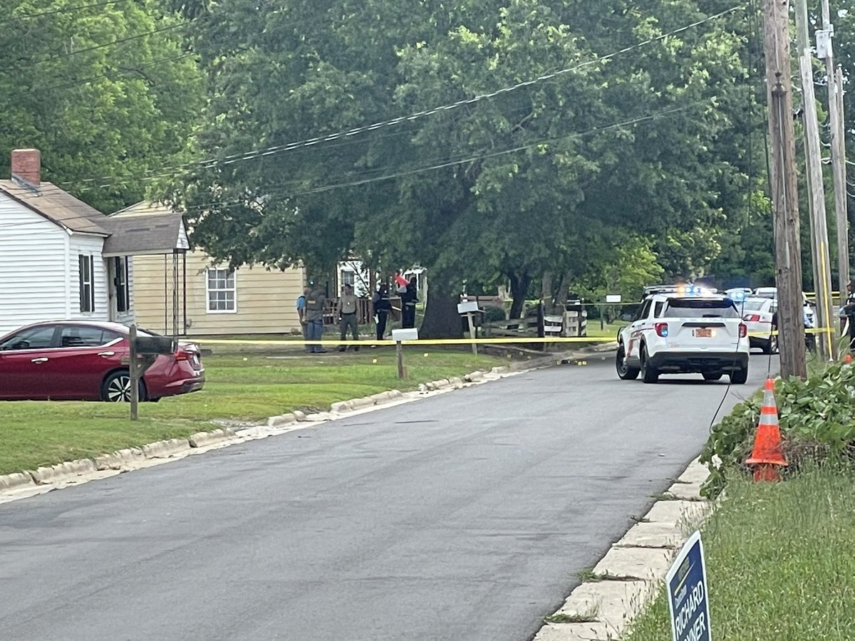 Shooting investigation underway at a home on Smith Street.   At least a dozen shell casing markers on the ground, no word yet what happened or if anyone was shot