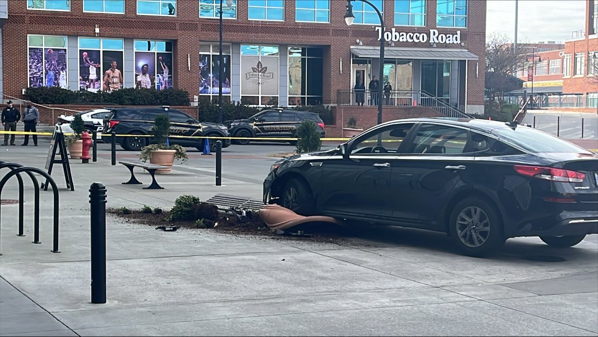 There is a chaotic scene unfolding right now at American Tobacco Campus in Durham, where police confirm they are responding to a shooting. @ChelseaDReports is on scene and reports multiple shell casings on the ground and a car crashed in front of the hotel & salon