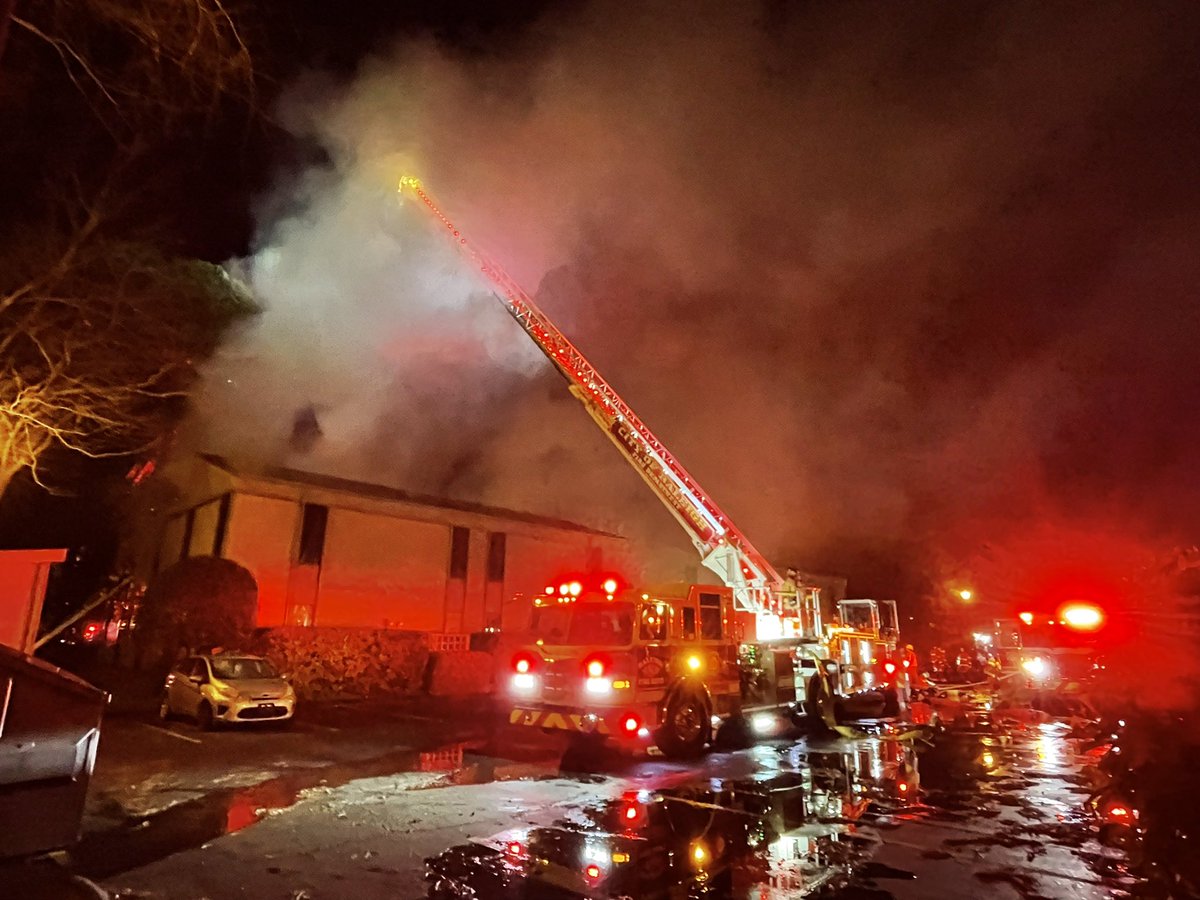 A fire destroyed an apt building on Logger Ct, just off Falls of Neuse Rd. Dozens of firefighters now on scene. Flames were visible shooting through the roof