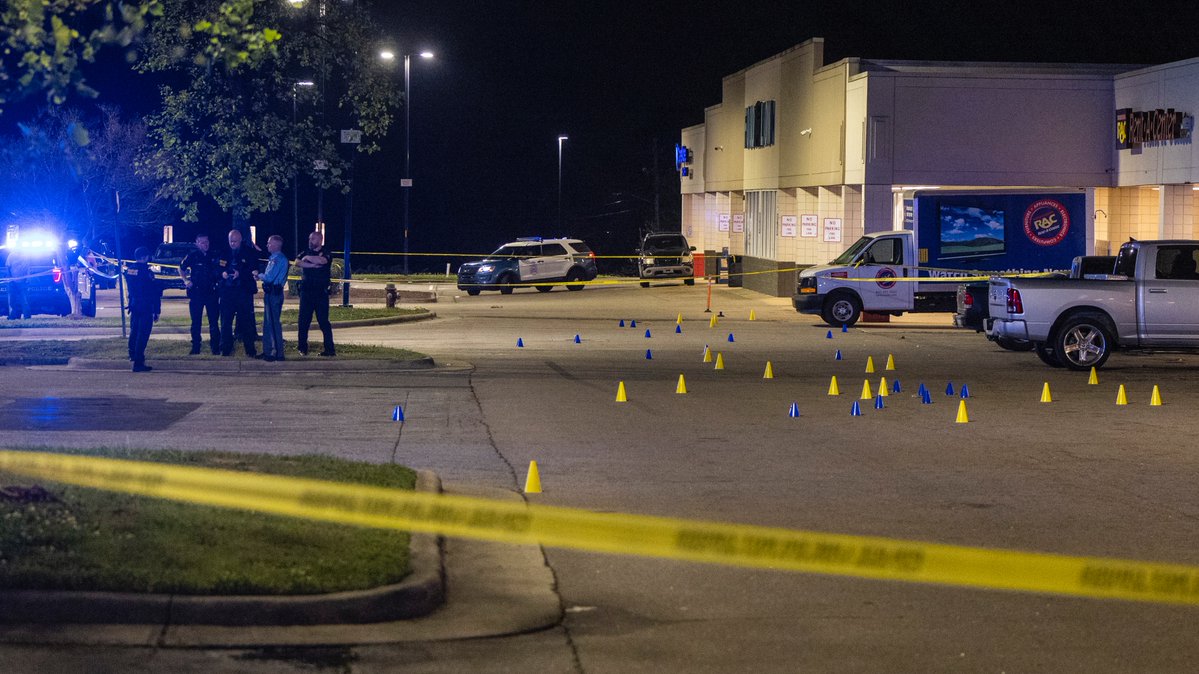 Police are investigating a shooting at the Raleigh Boulevard Shopping Center that occurred around 9 p.m. Monday. At least 50 evidence cones were in the parking lot and at least three bullet holes in the front windows of a Food Lion. Reports of injuries