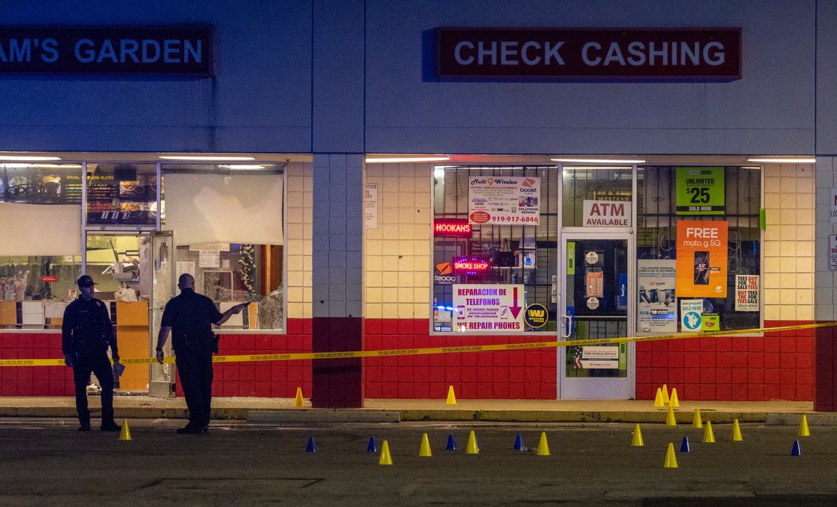 Police are investigating a shooting at the Raleigh Boulevard Shopping Center that occurred around 9 p.m. Monday. At least 50 evidence cones were in the parking lot and at least three bullet holes in the front windows of a Food Lion. Reports of injuries