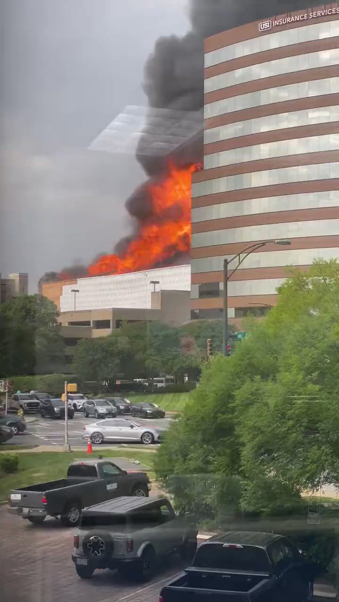 COLLAPSE: A massive fire is tearing through a building in the SouthPark area of Charlotte.