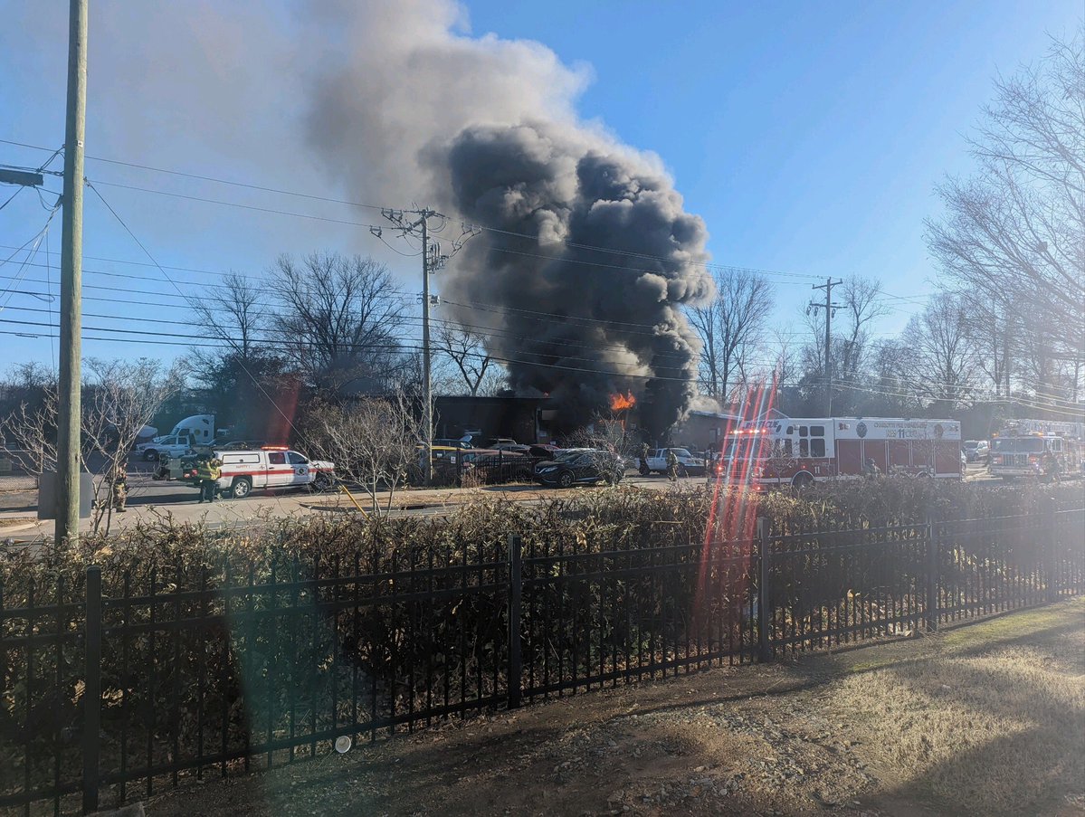 One person sent to hospital after two-alarm fire breaks out at north Charlotte auto shop.