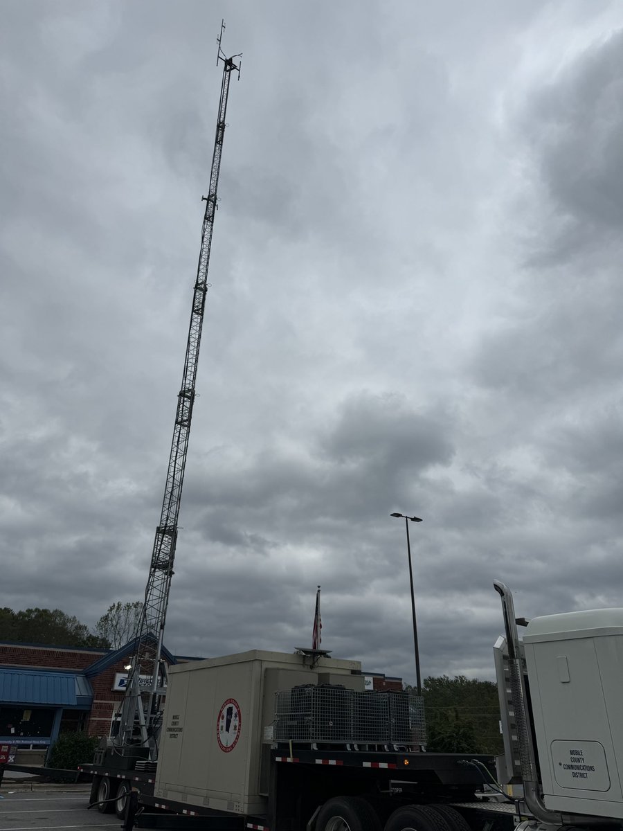 This mobile tower for first responder comm was set up in local parking lot this pm. Driver drove all night to get here from South AL.