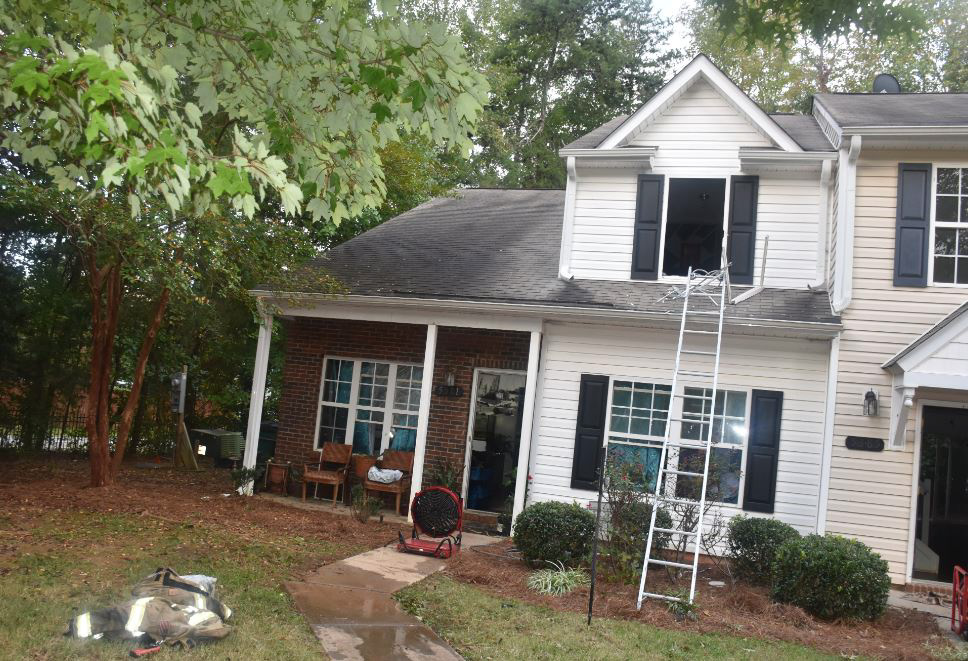 Two Charlotte families were displaced recently after both of their homes burned from the same source