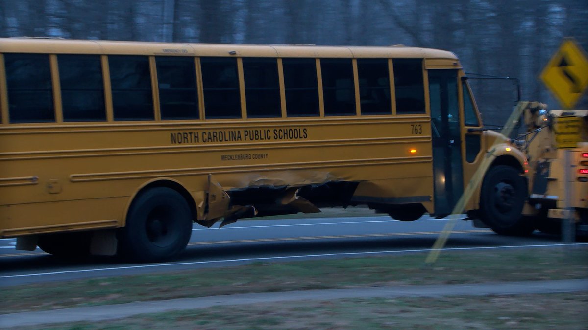 Two people were seriously injured in a crash involving a school bus in east Charlotte Monday morning, according to officials