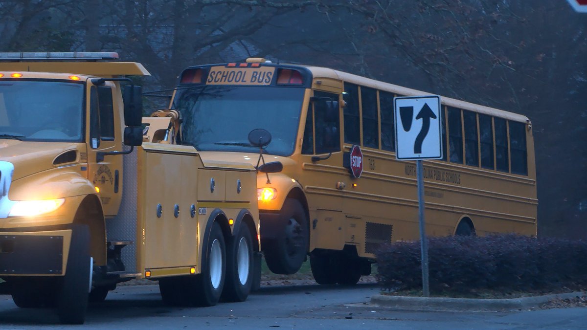 Two people were seriously injured in a crash involving a school bus in east Charlotte Monday morning, according to officials