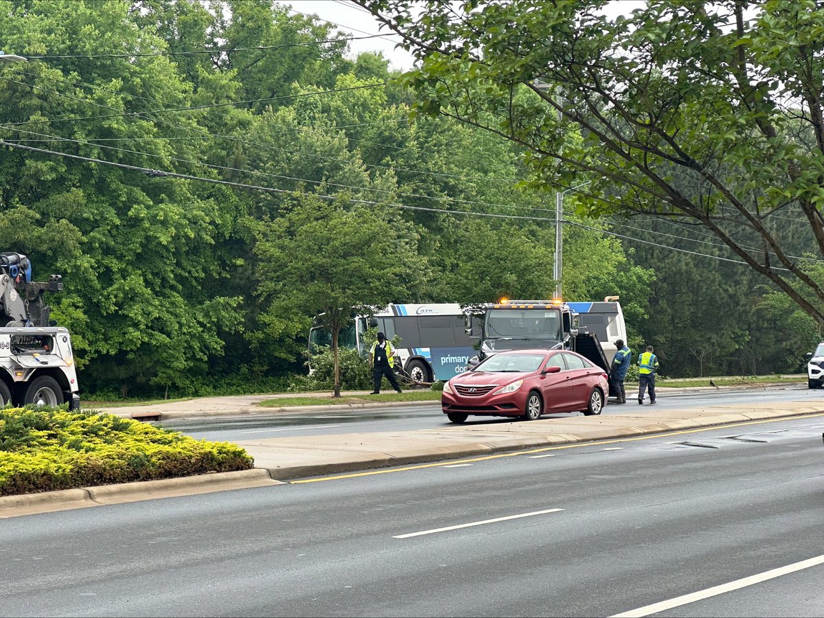 Seven people were hurt after a CATS bus crashed into utility poles and a tree during a two-vehicle collision in Charlotte on Thursday, according to officials