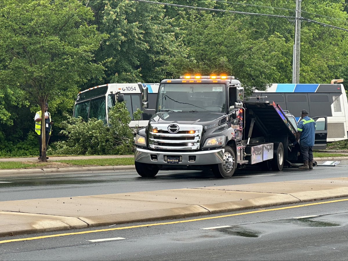 Seven people were hurt after a CATS bus crashed into utility poles and a tree during a two-vehicle collision in Charlotte on Thursday, according to officials