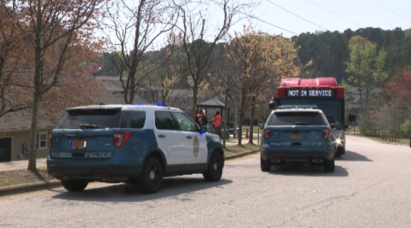 Four people are at large after a fight on a bus led to a gun being fired in Raleigh late Friday morning, police said.