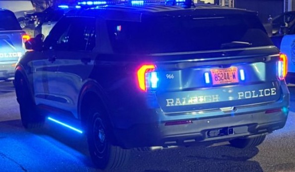 A fight at a Raleigh smoke shop turned violent, leaving a woman injured after being pistol-whipped and shot, police said