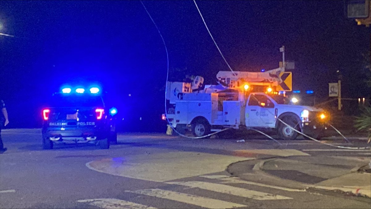 Two people were injured after a vehicle crashed into a power pole in Raleigh's Five Points neighborhood early Monday morning, knocking out electricity to hundreds of customers