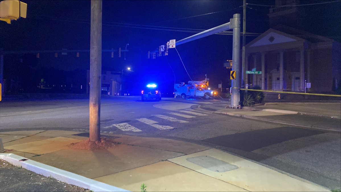 Two people were injured after a vehicle crashed into a power pole in Raleigh's Five Points neighborhood early Monday morning, knocking out electricity to hundreds of customers