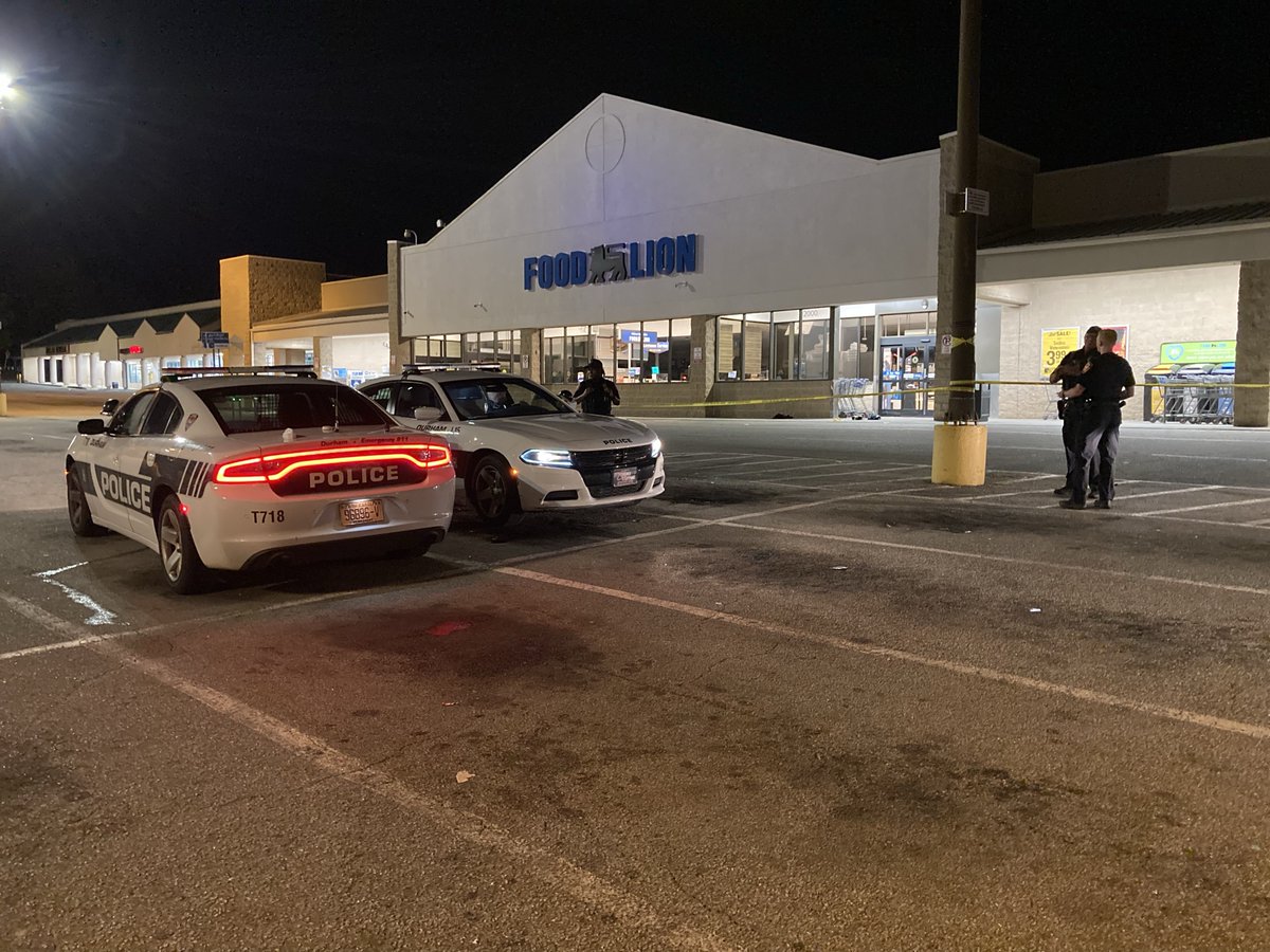 A man was hospitalized after a late-night shooting outside a Durham grocery store, police said. Officers searched the area for evidence as the investigation continued.